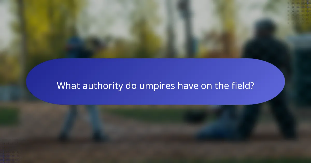 What authority do umpires have on the field?
